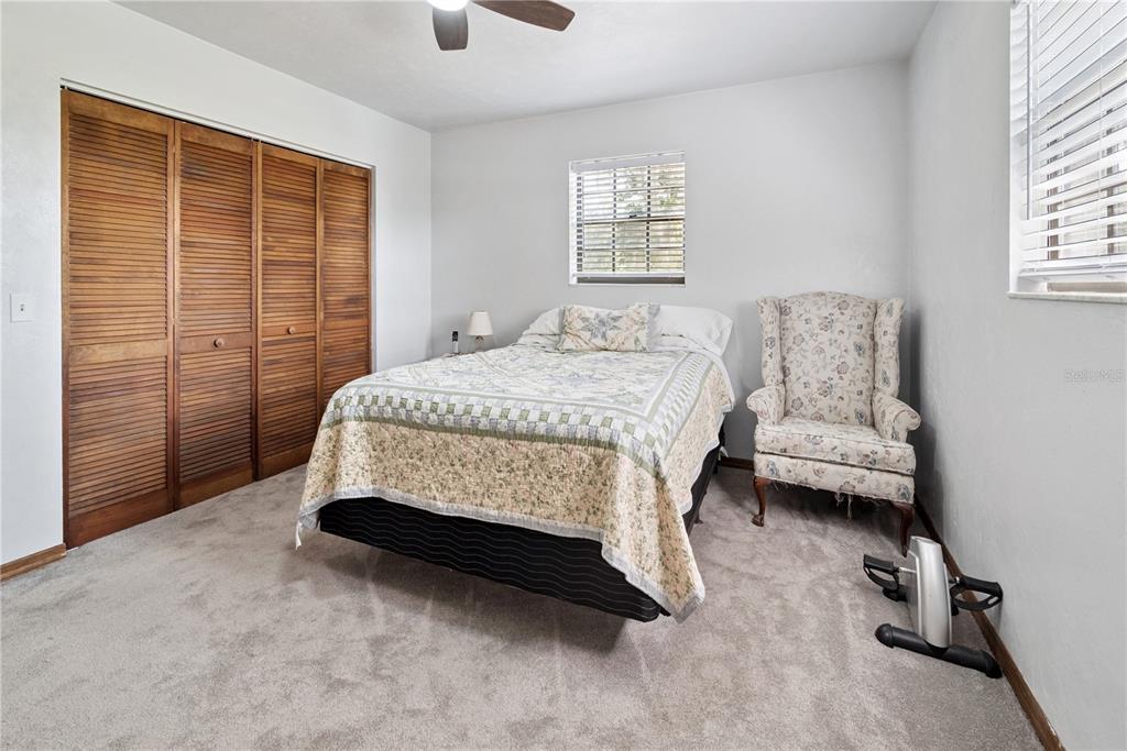 5098 Southwest 47th Loop Lake Butler, FL 32054 - Photo 25 of 34 a bedroom with a bed and a window