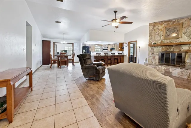 a living room with furniture and flat screen tv