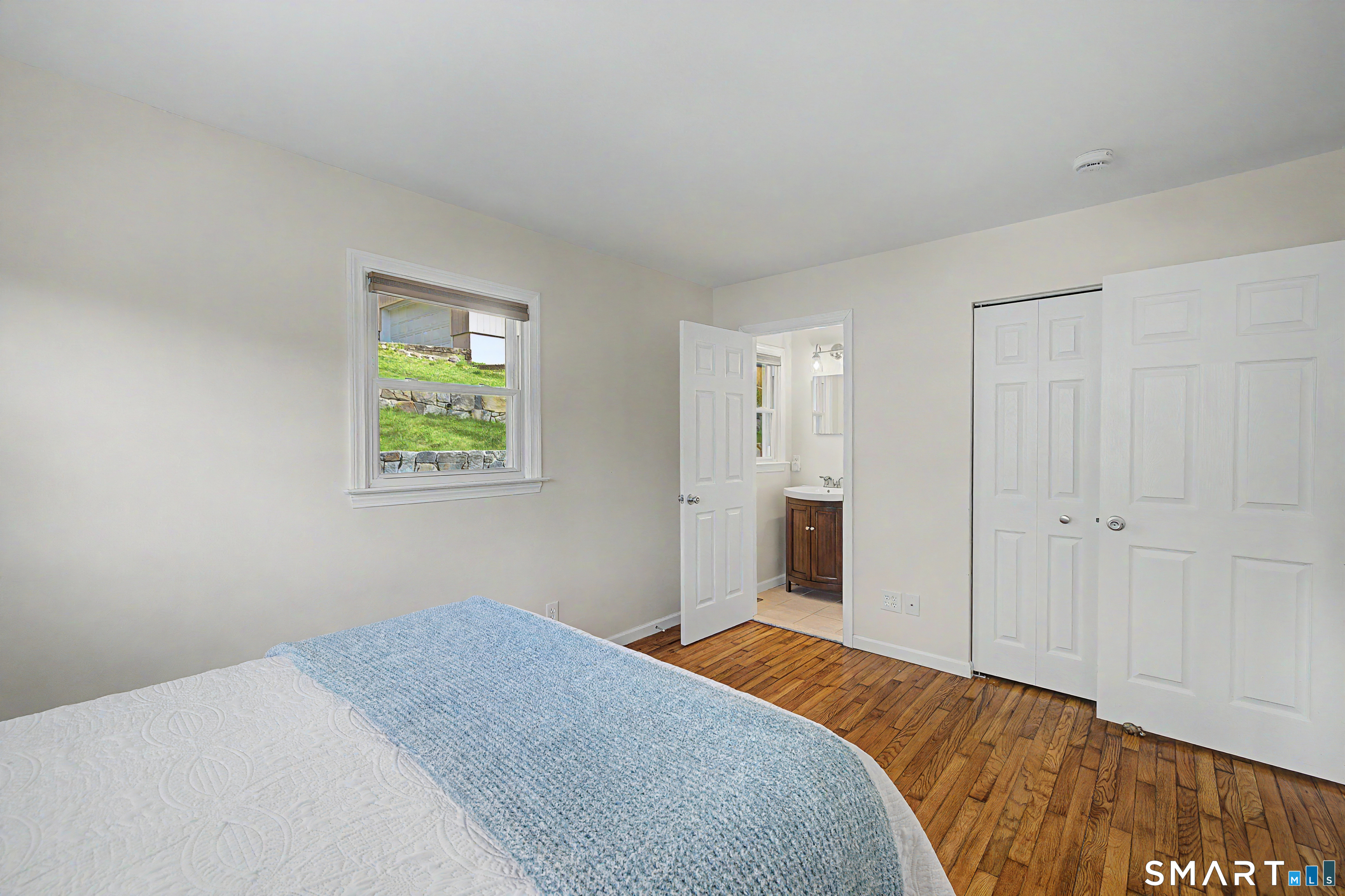 11 Candlewood Springs Road New Milford, CT 06776 - Photo 22 of 35 a bedroom with a bed and a window