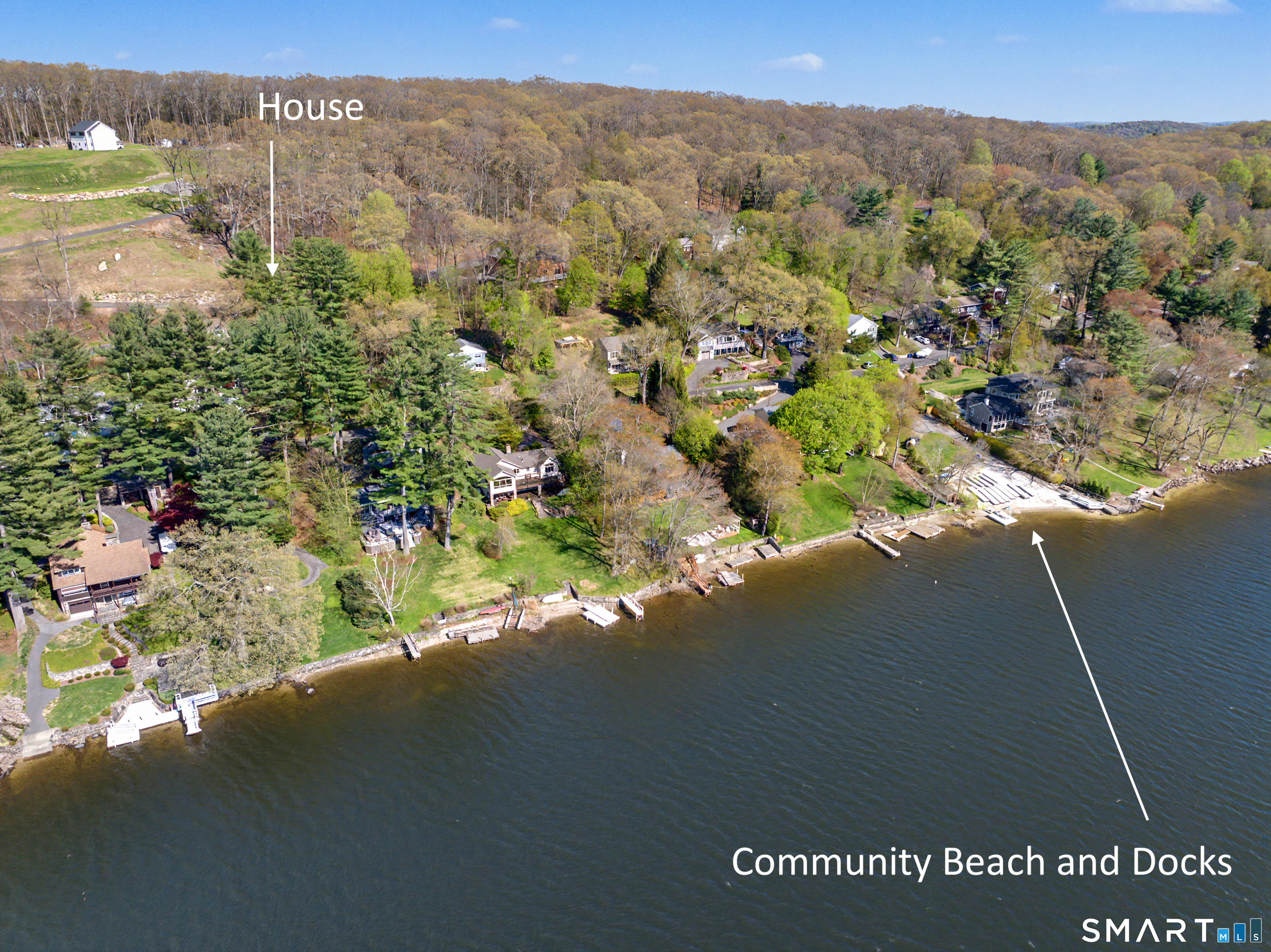 11 Candlewood Springs Road New Milford, CT 06776 - Photo 33 of 35 a view of a lake with a mountain in the background