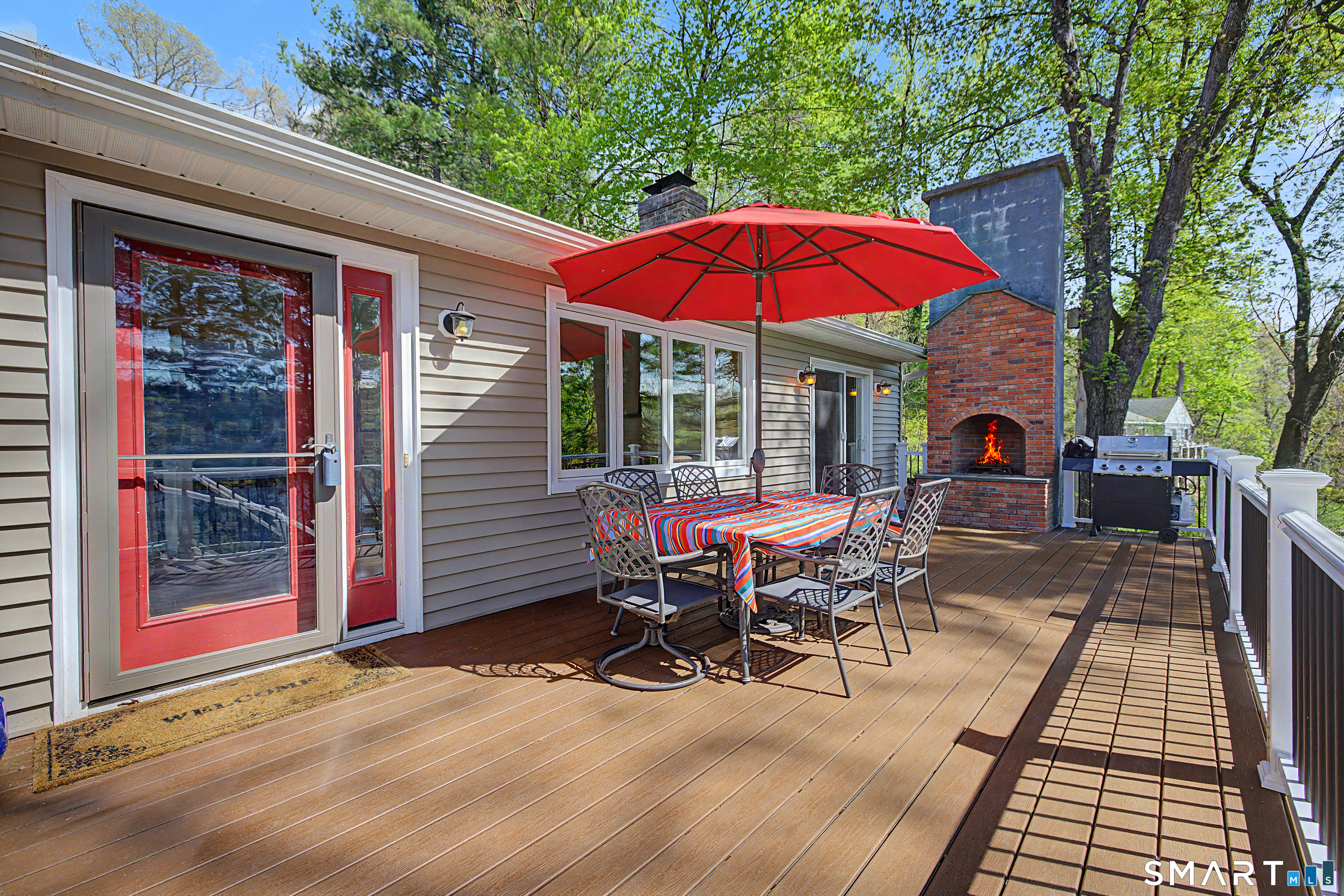 11 Candlewood Springs Road New Milford, CT 06776 - Photo 6 of 35 a view of a chairs with a table in the patio