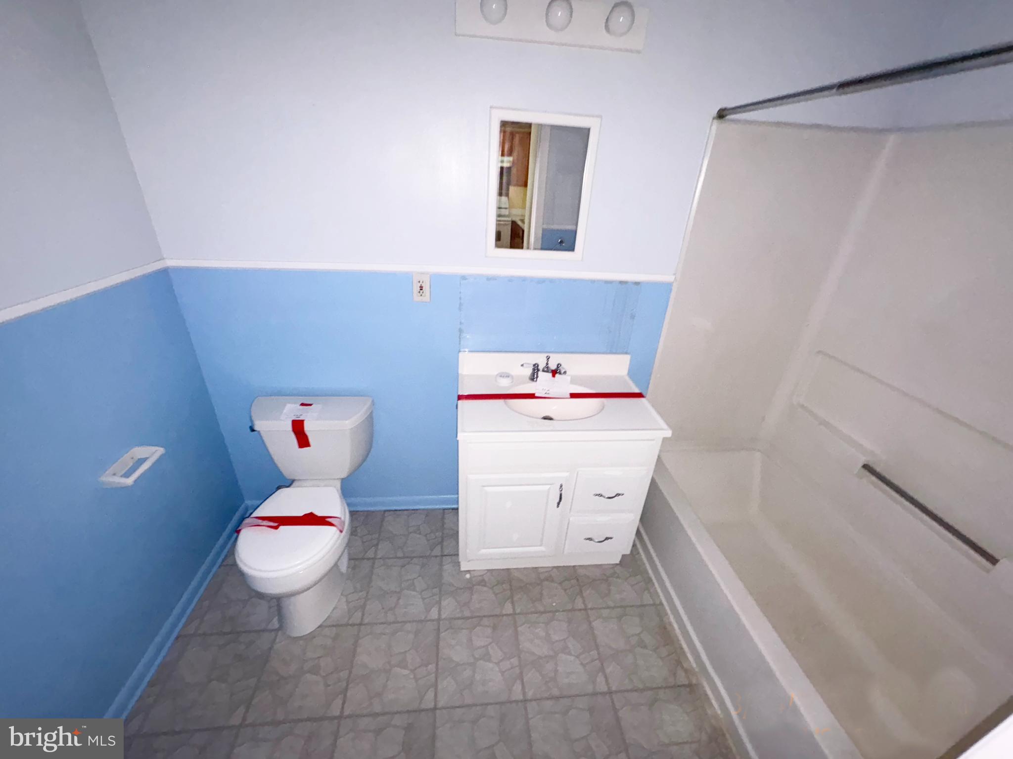 19 Foxglove Drive Delran, NJ 08075 - Photo 9 of 12 a bathroom with a sink and toilet