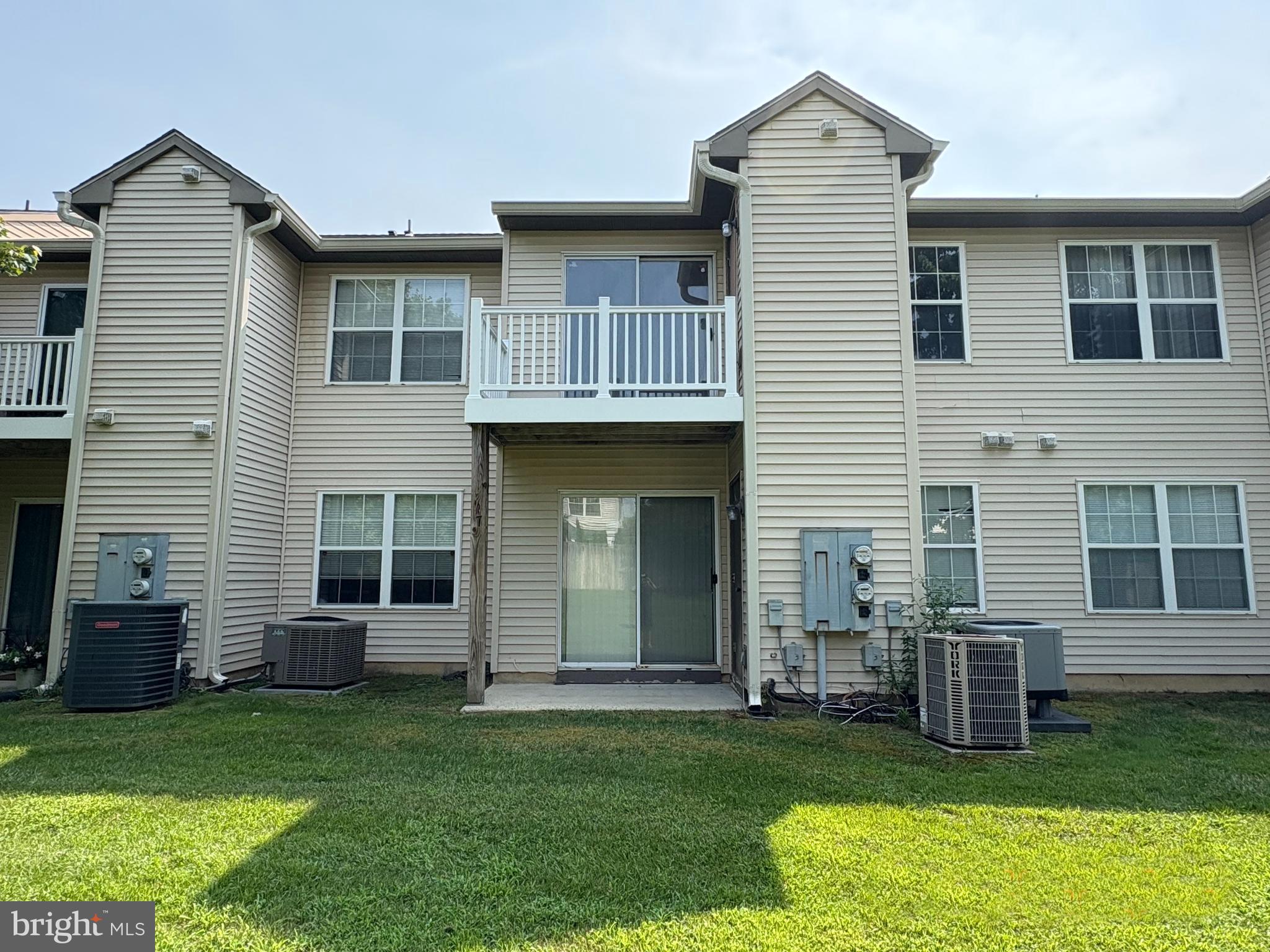 19 Foxglove Drive Delran, NJ 08075 - Photo 10 of 12 a view of a house with a yard and a large window