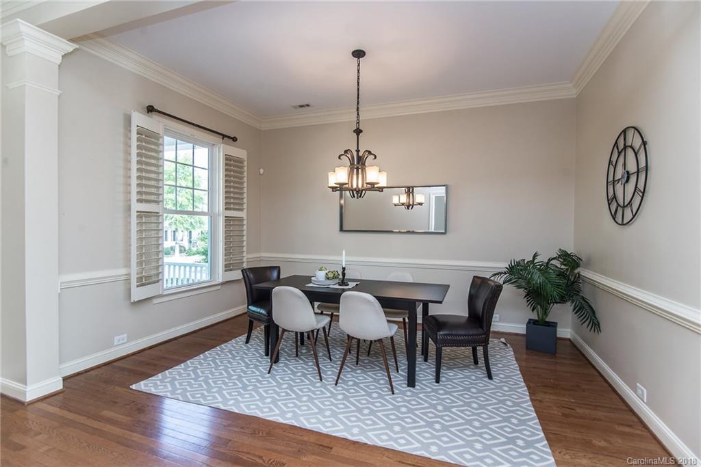 944 Gardenia Street Fort Mill, SC 29708 - Photo 12 of 35 a view of a dining room with furniture window and wooden floor