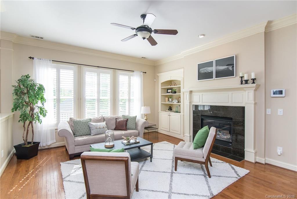 944 Gardenia Street Fort Mill, SC 29708 - Photo 16 of 35 a living room with furniture and a fireplace