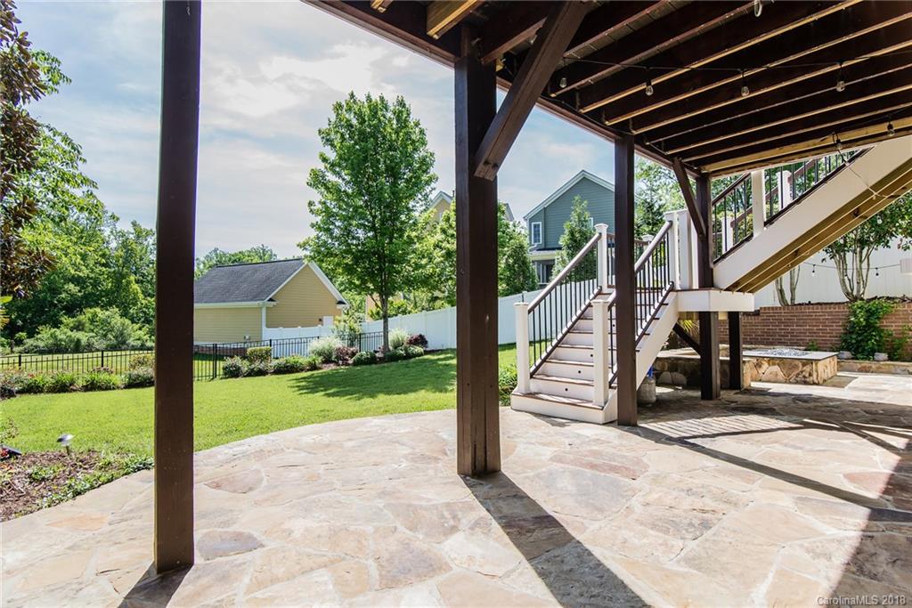 944 Gardenia Street Fort Mill, SC 29708 - Photo 7 of 35 a view of a couches in the patio with a small yard