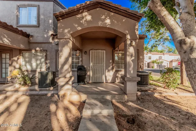 a view of entrance gate of a house