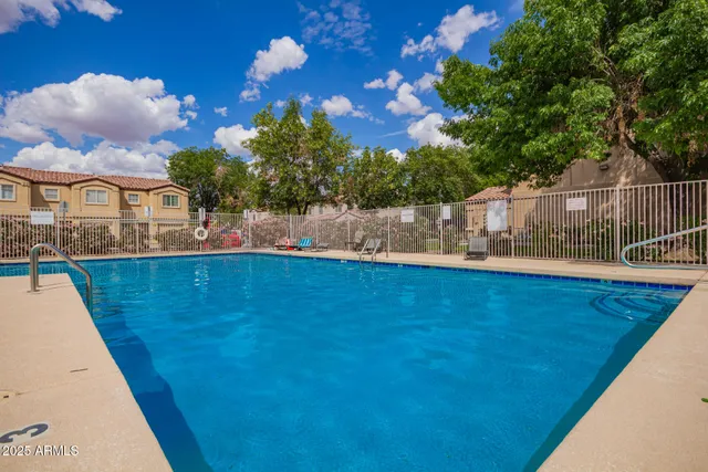 a view of a house with swimming pool