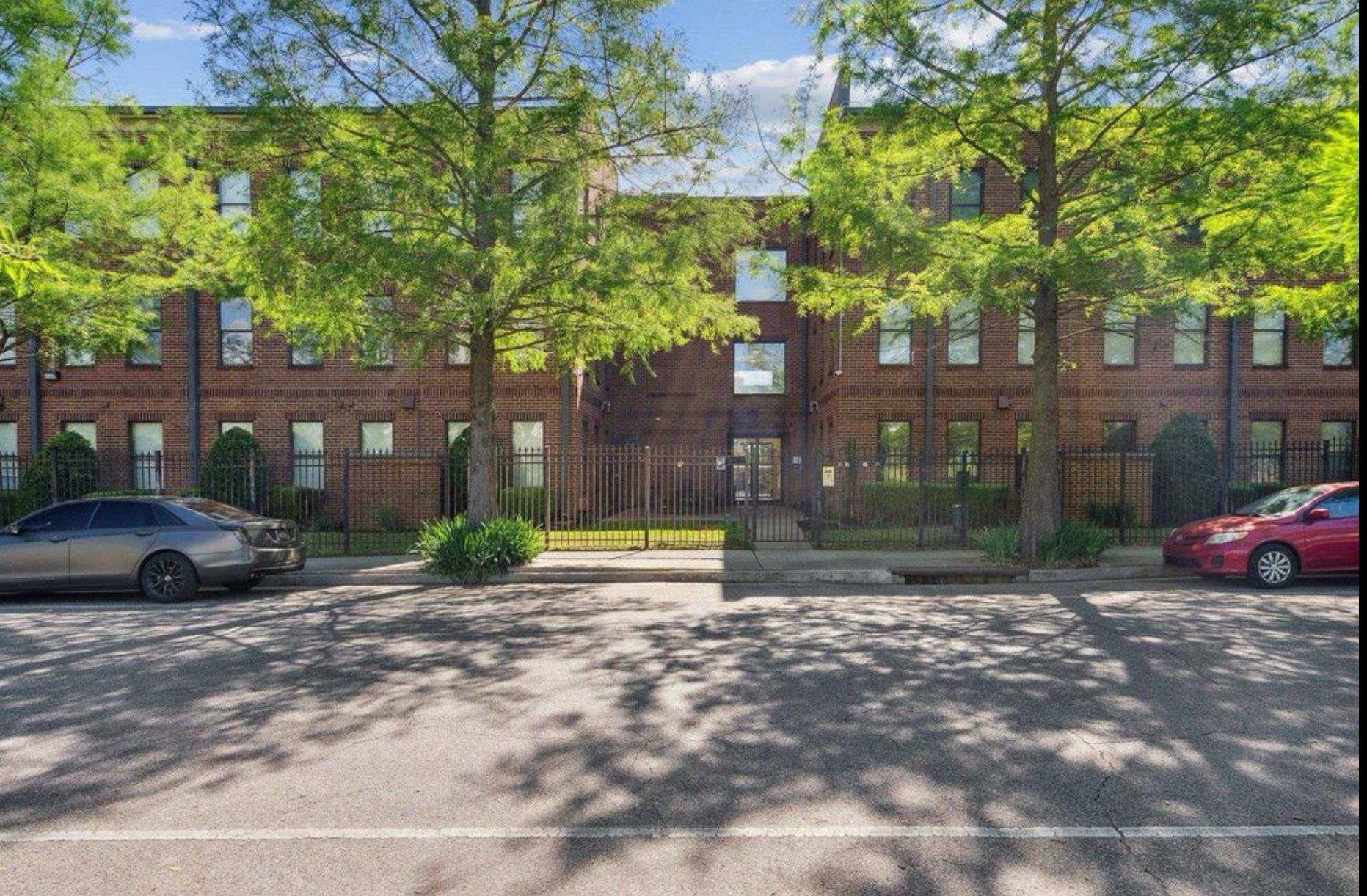 731 Litty Court, Unit 305 Memphis, TN 38103 - Photo 15 of 15 a view of street with parked cars