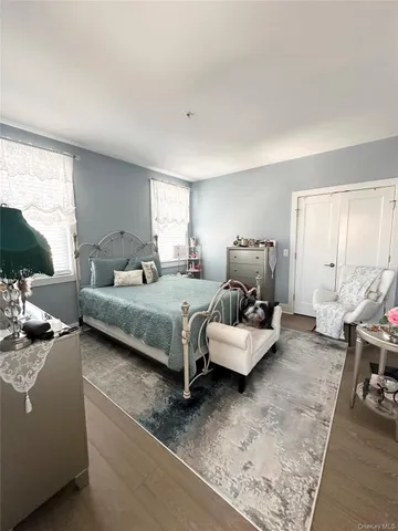 a bedroom with furniture and a couch