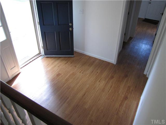 716 Merwin Road Raleigh, NC 27606 - Photo 4 of 24 Foyer looking toward bath and laundry room
