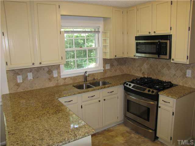 716 Merwin Road Raleigh, NC 27606 - Photo 10 of 24 Granite Counter tops & gas range