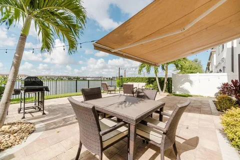 a view of an outdoor space with furniture
