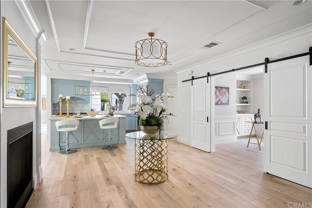 2159 Lorain Road San Marino, CA 91108 - Photo 11 of 42 a kitchen with kitchen island white cabinets and stainless steel appliances