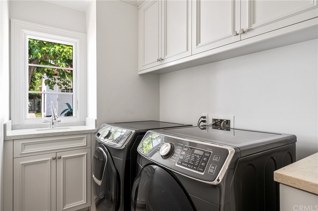 2159 Lorain Road San Marino, CA 91108 - Photo 19 of 42 a view of kitchen sink with stove and cabinets