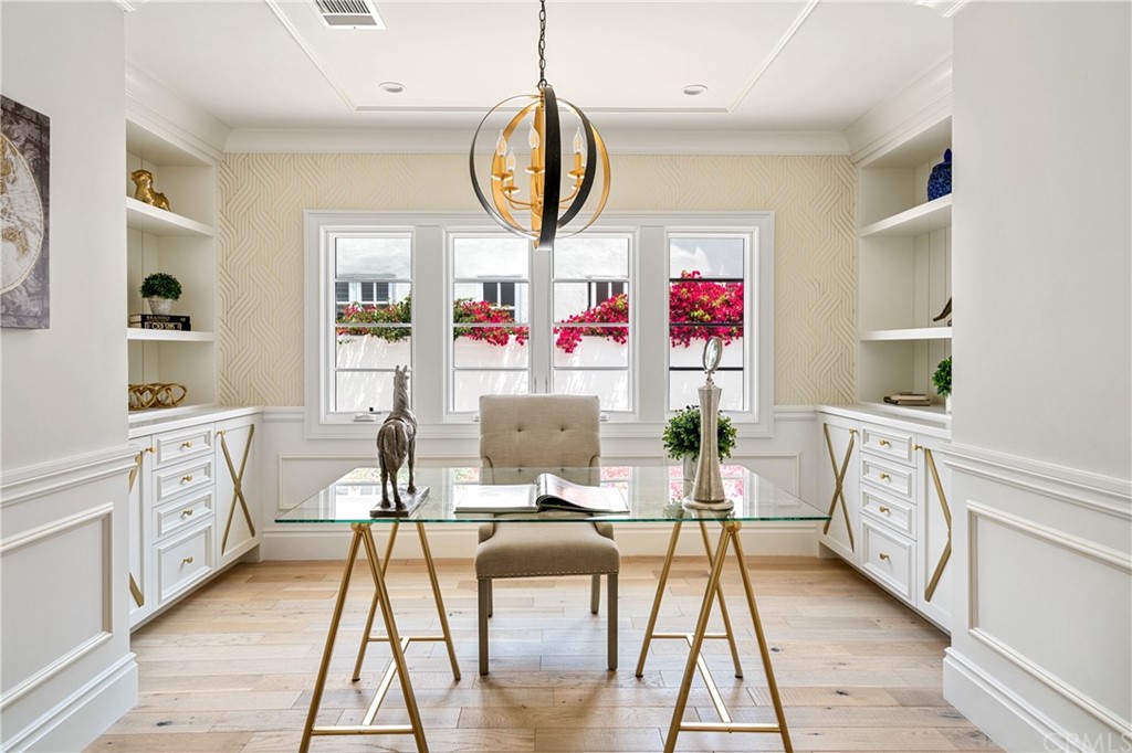 2159 Lorain Road San Marino, CA 91108 - Photo 20 of 42 a very nice looking kitchen with granite countertop a stove a sink and white cabinets
