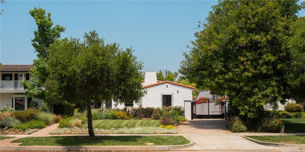 2159 Lorain Road San Marino, CA 91108 - Photo 3 of 42 a front view of a house with a yard