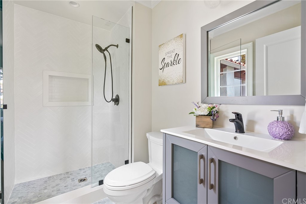 2159 Lorain Road San Marino, CA 91108 - Photo 23 of 42 a bathroom with a sink toilet and shower