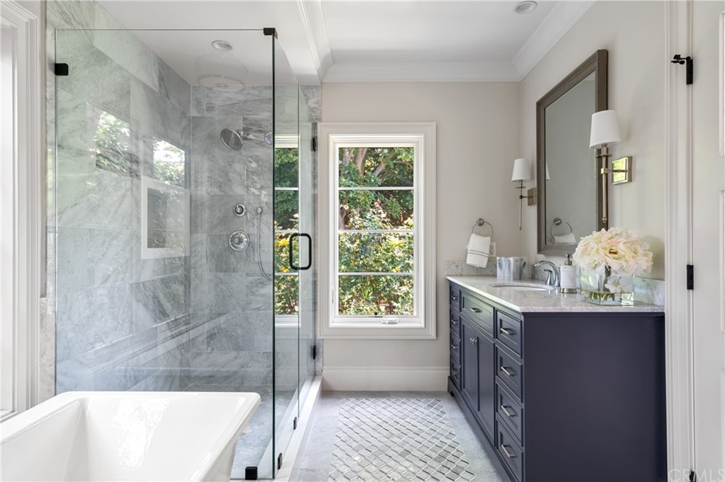 2159 Lorain Road San Marino, CA 91108 - Photo 28 of 42 a bathroom with a tub sink and shower