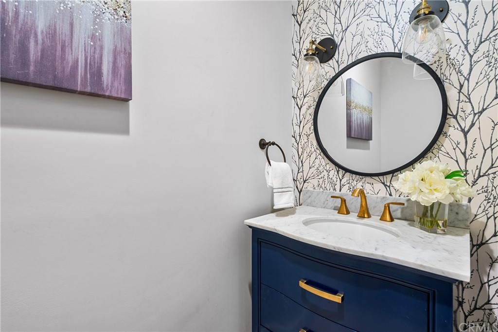 2159 Lorain Road San Marino, CA 91108 - Photo 33 of 42 a bathroom with a sink and a mirror