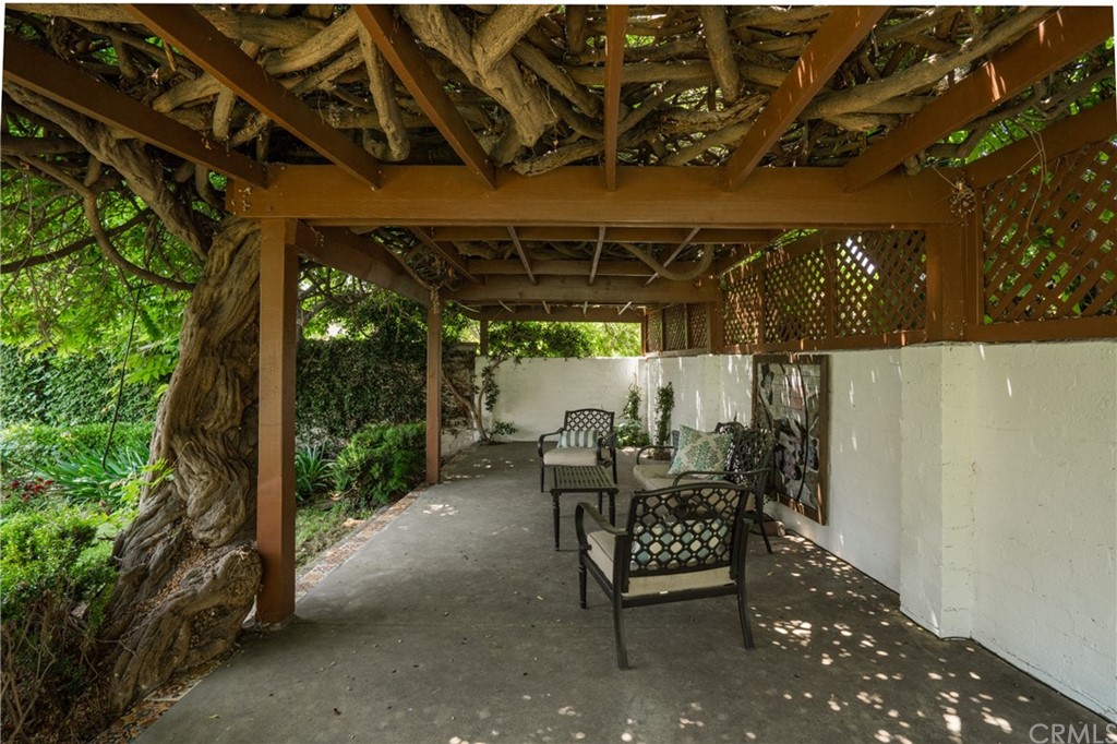 2159 Lorain Road San Marino, CA 91108 - Photo 39 of 42 a view of a chairs and table in the patio next to a yard
