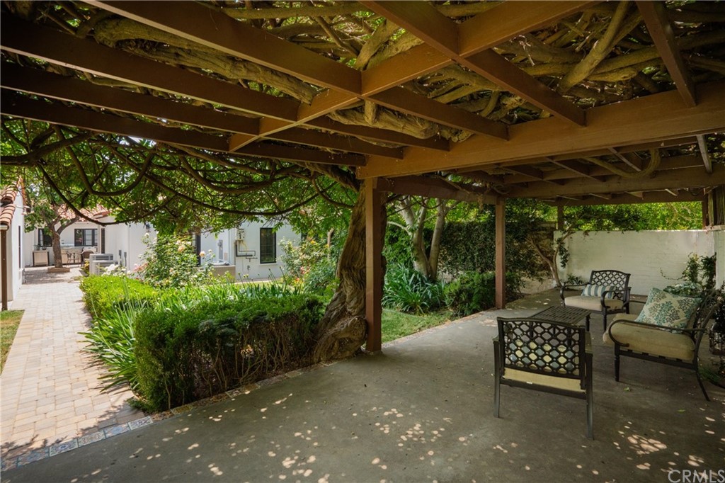 2159 Lorain Road San Marino, CA 91108 - Photo 40 of 42 a view of a patio with table and chairs and potted plants