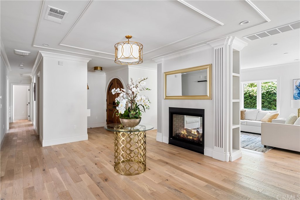 2159 Lorain Road San Marino, CA 91108 - Photo 7 of 42 a living room with furniture and a fireplace