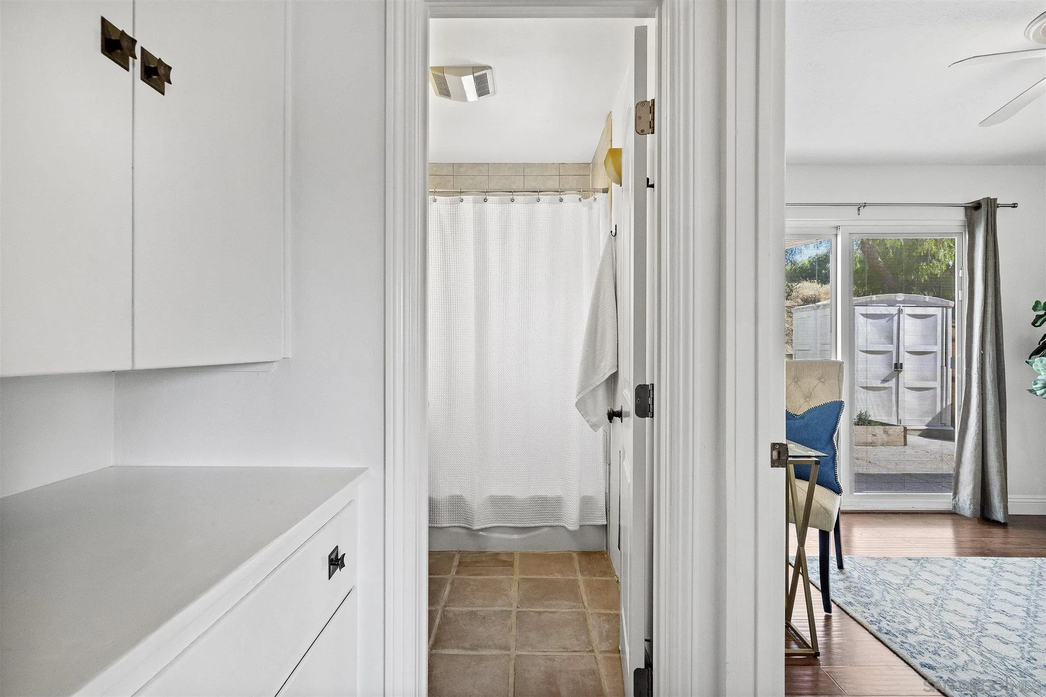 9115 Old Castle Road Valley Center, CA 92082 - Photo 16 of 30 a bathroom with a granite countertop sink and a mirror