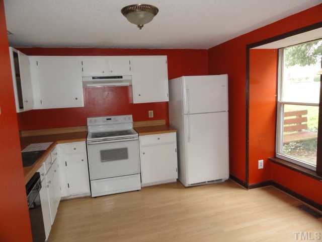 1130 Villa Green Court Raleigh, NC 27612 - Photo 3 of 9 a utility room with dryer and washer