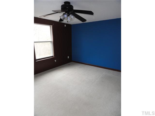 1130 Villa Green Court Raleigh, NC 27612 - Photo 6 of 9 a view of an empty room with a window