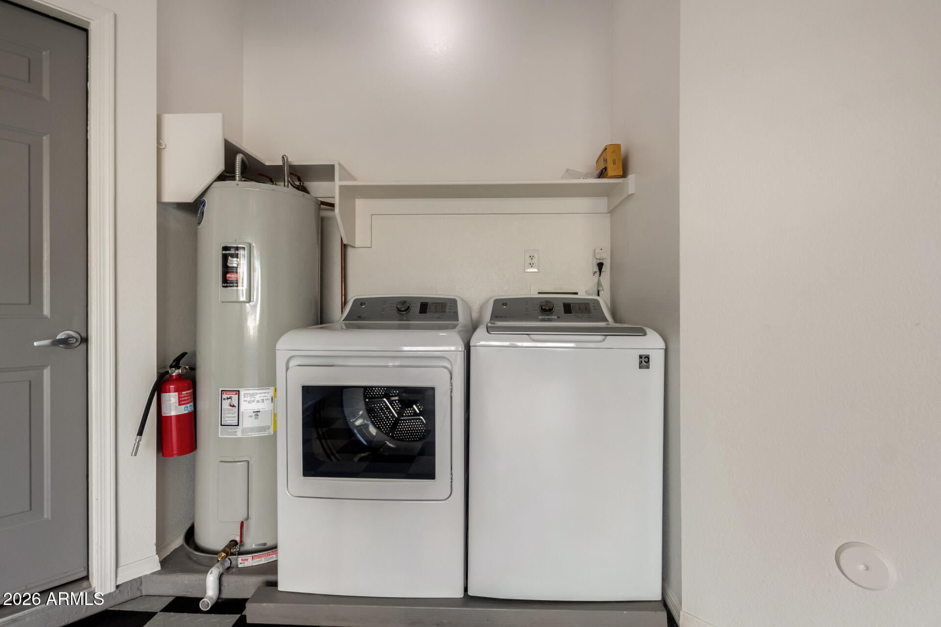 100 East Fillmore Street, Unit 119 Phoenix, AZ 85004 - Photo 21 of 34 a utility room with dryer and washer
