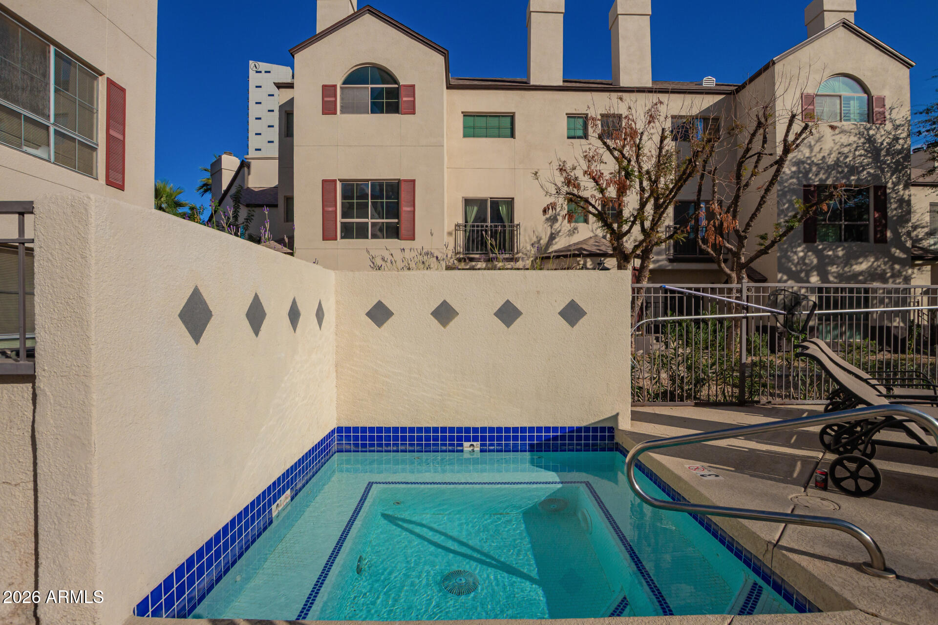 100 East Fillmore Street, Unit 119 Phoenix, AZ 85004 - Photo 29 of 34 a house view with a outdoor space