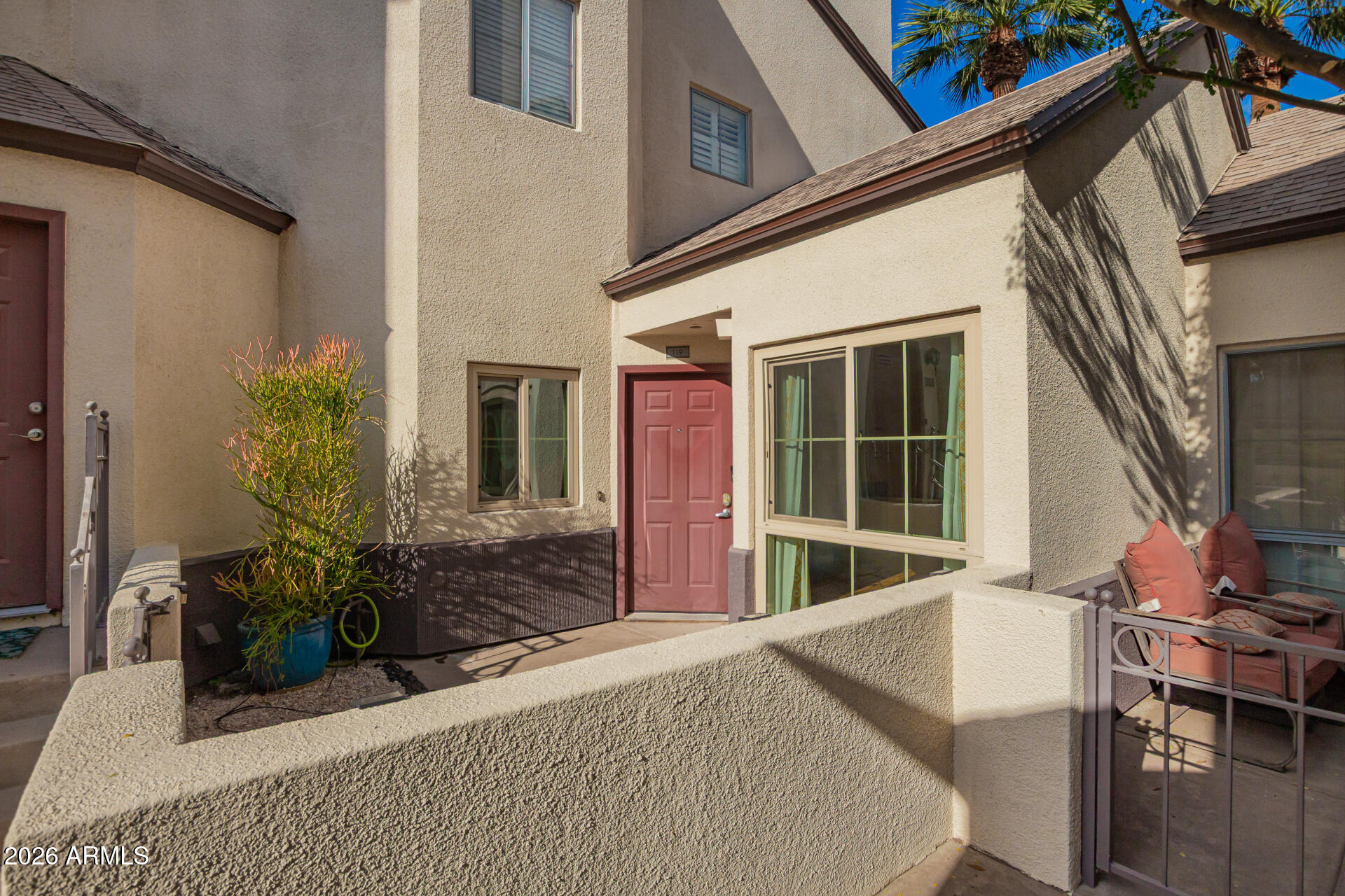 100 East Fillmore Street, Unit 119 Phoenix, AZ 85004 - Photo 3 of 34 a house view with a outdoor space