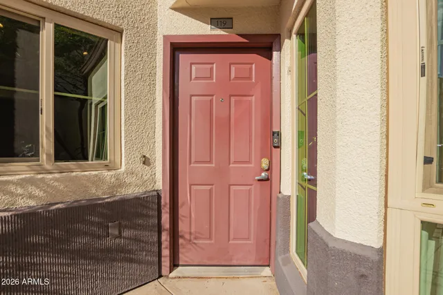 a bathroom with a sink and a large mirror