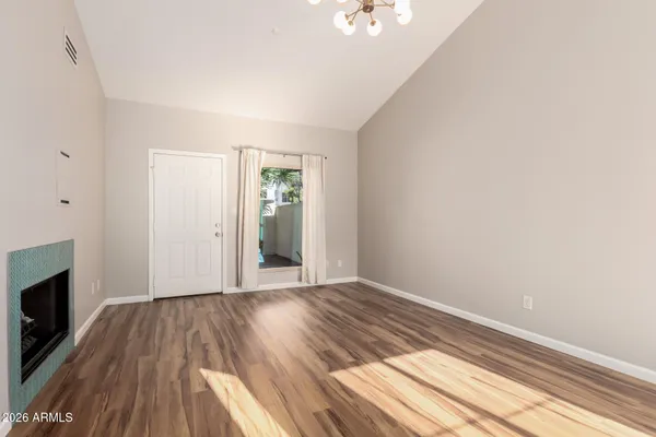 a view of a kitchen from the hallway