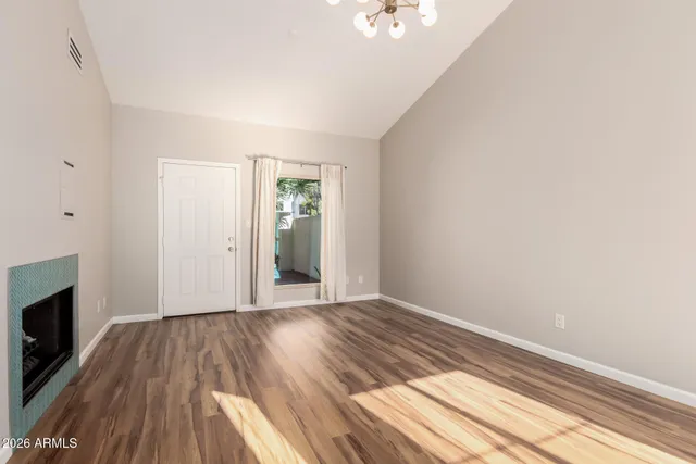 a view of a kitchen from the hallway