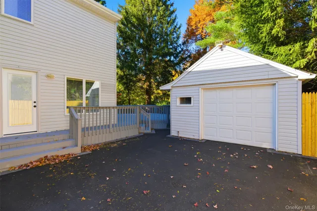 a front view of a house with a garage