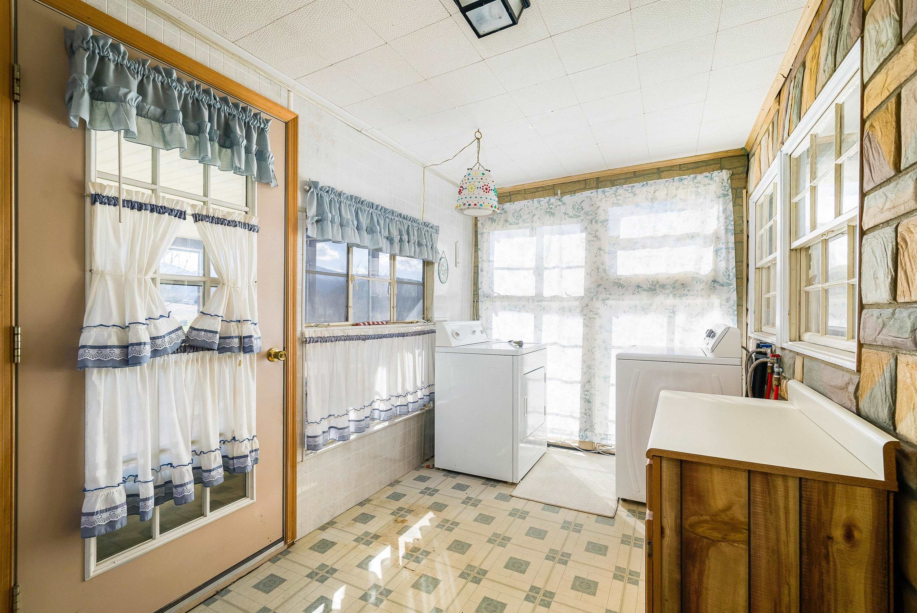 18753 Mt Pleasant Road Elkton, VA 22827 - Photo 23 of 34 a room with a large window and bed