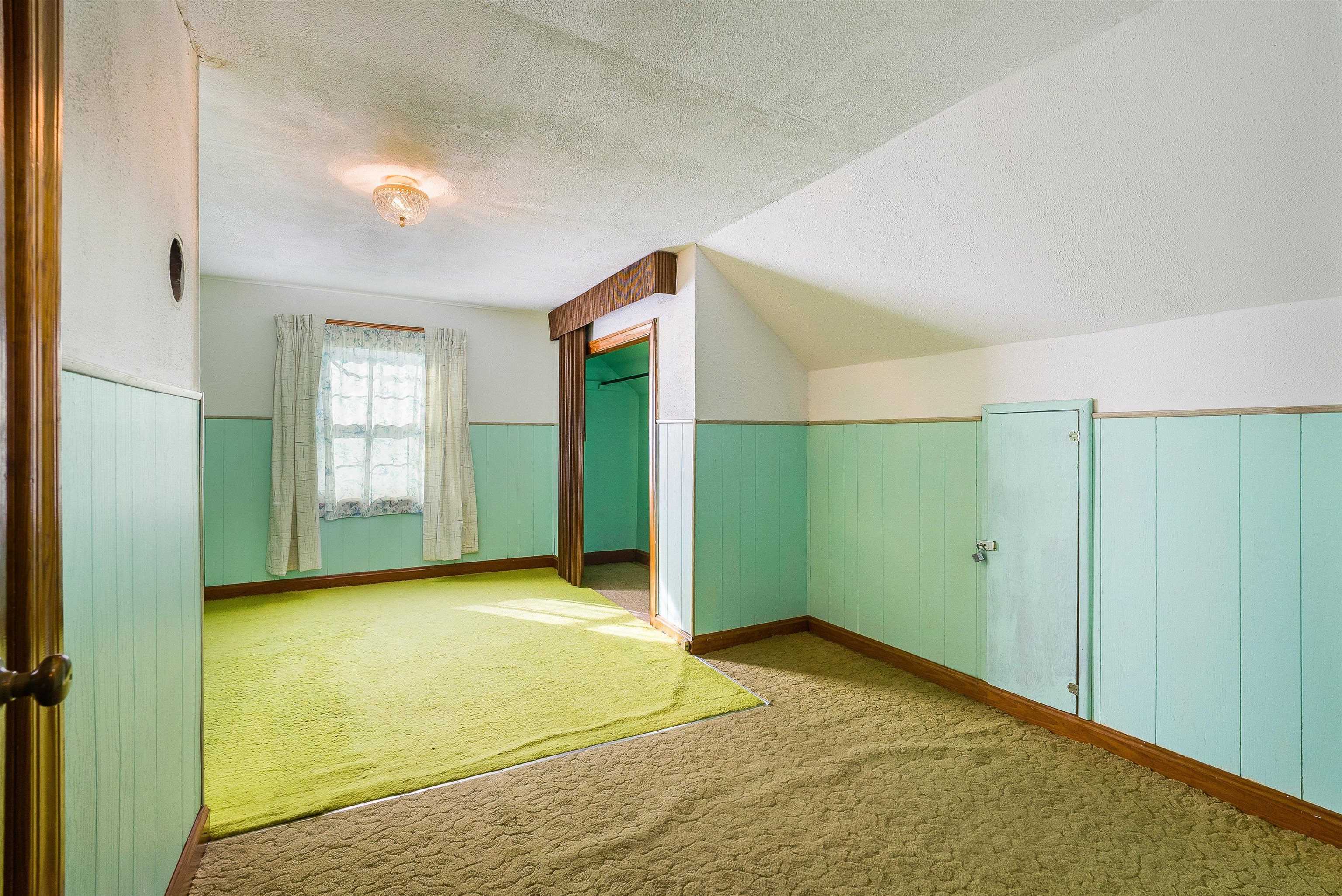 18753 Mt Pleasant Road Elkton, VA 22827 - Photo 26 of 34 a view of an empty room with window and stairs