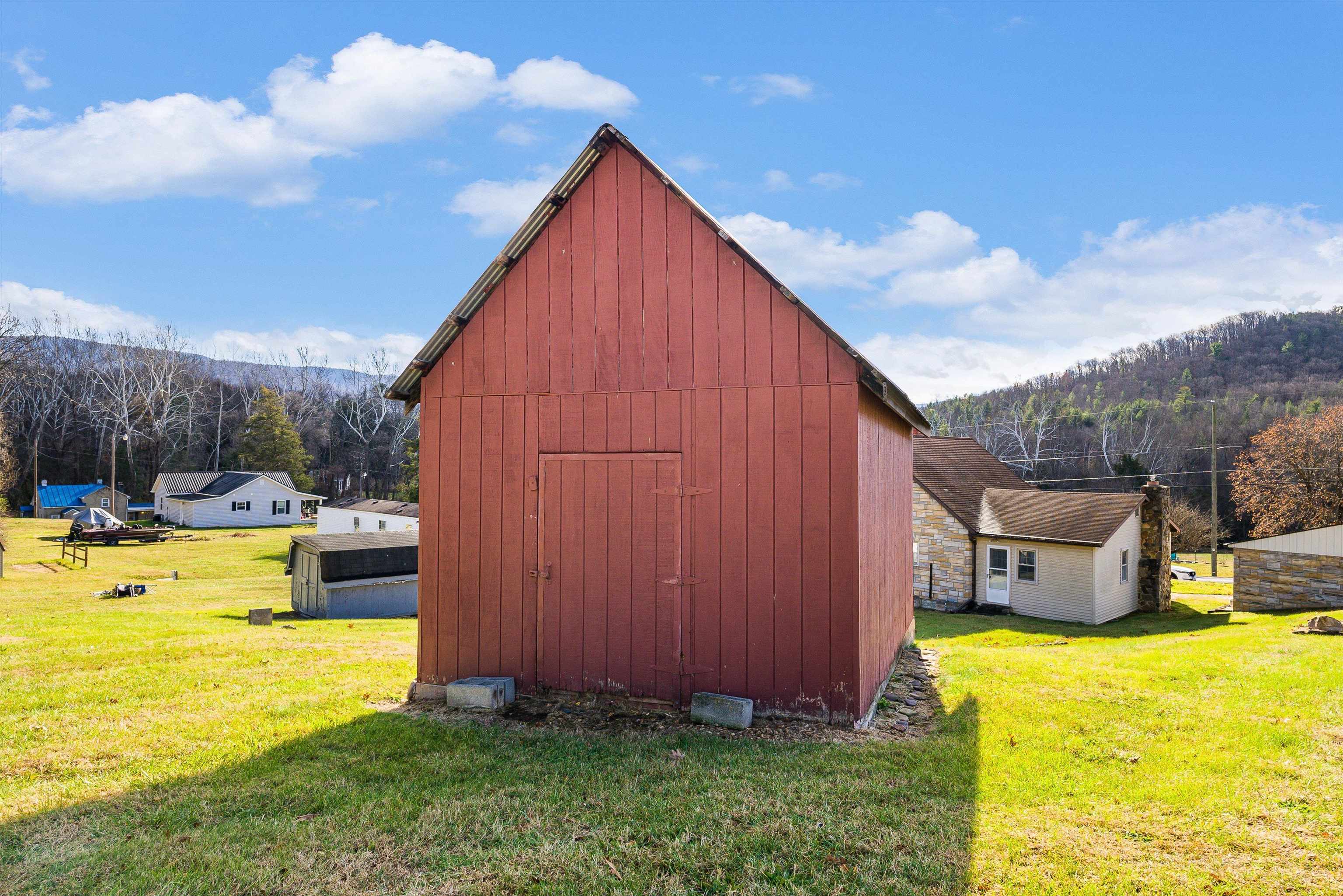 18753 Mt Pleasant Road Elkton, VA 22827 - Photo 34 of 34 a view of a swimming pool with a yard and sitting area