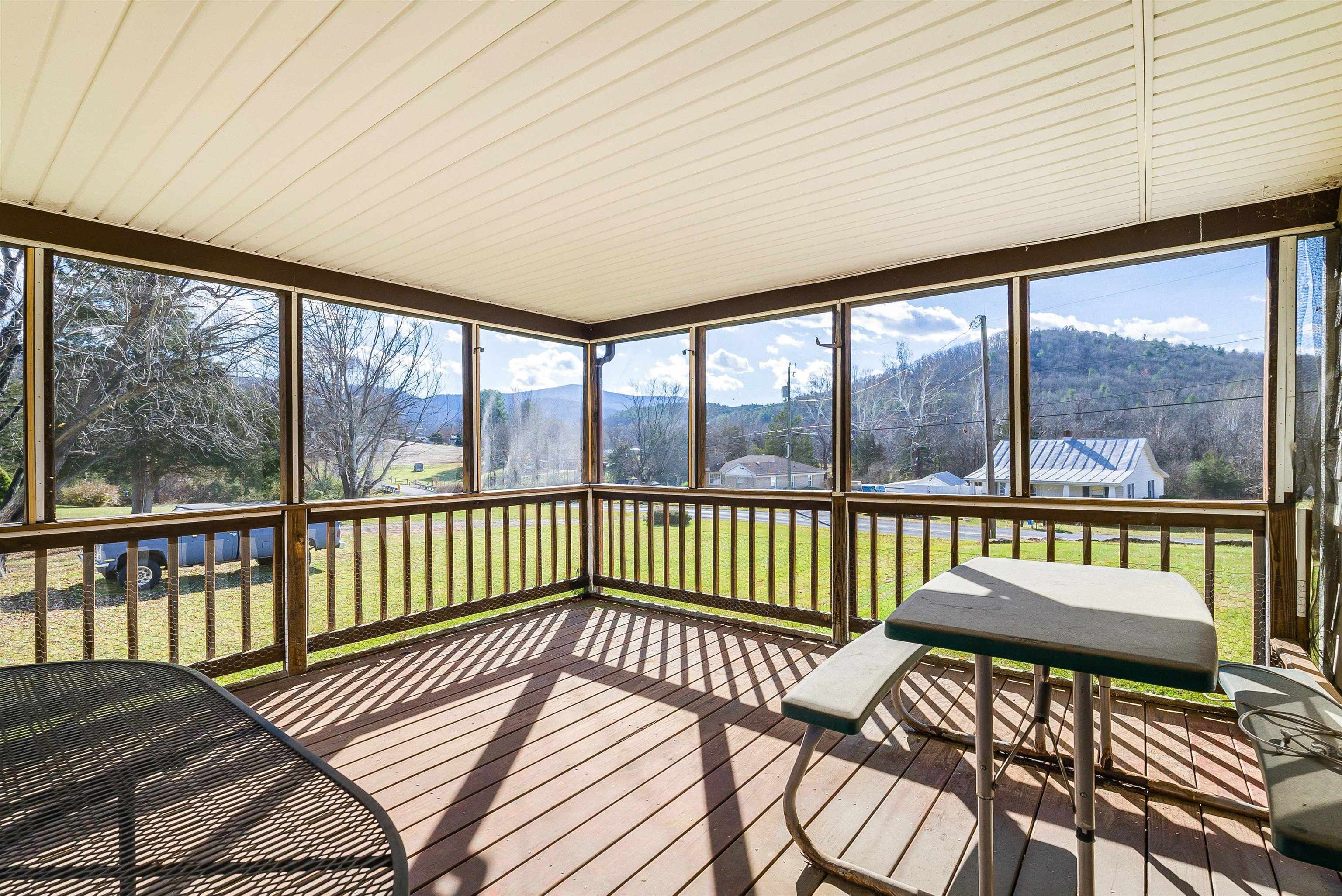 18753 Mt Pleasant Road Elkton, VA 22827 - Photo 8 of 34 a view of a balcony with wooden floor
