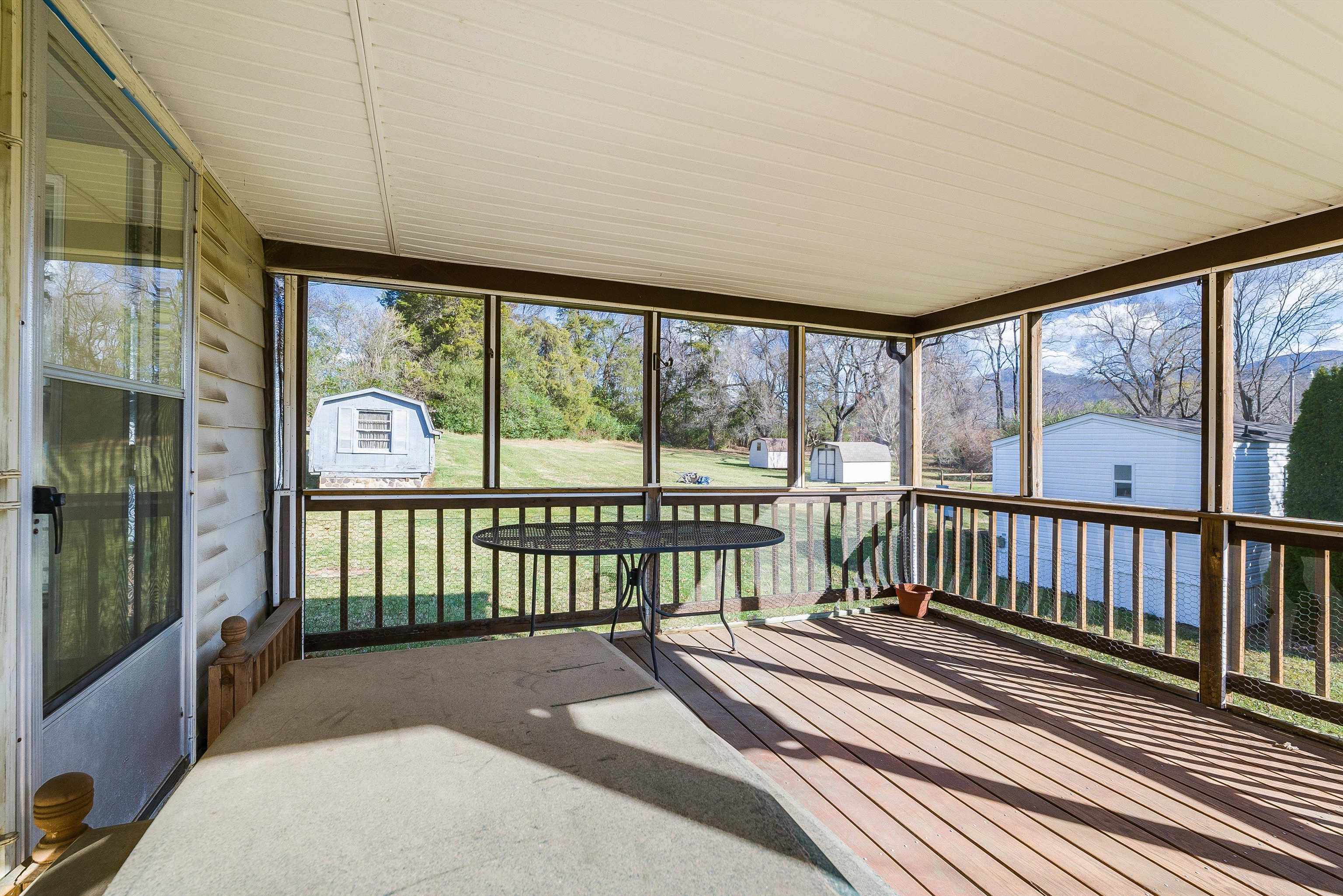 18753 Mt Pleasant Road Elkton, VA 22827 - Photo 9 of 34 a view of a balcony with wooden floor