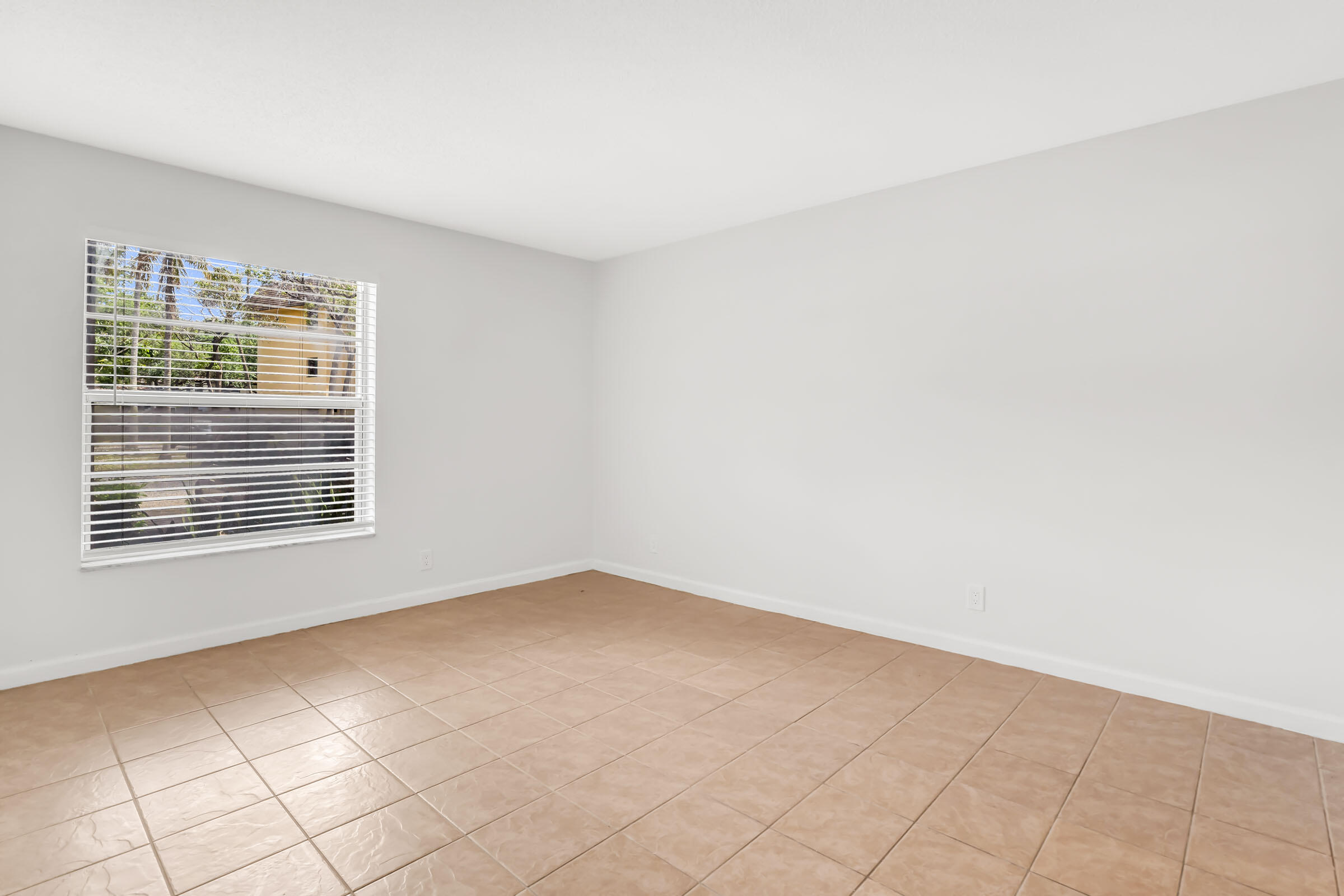 490 Northwest 20th Street, Unit 1030 Boca Raton, FL 33431 - Photo 5 of 18 Primary Bedroom 1