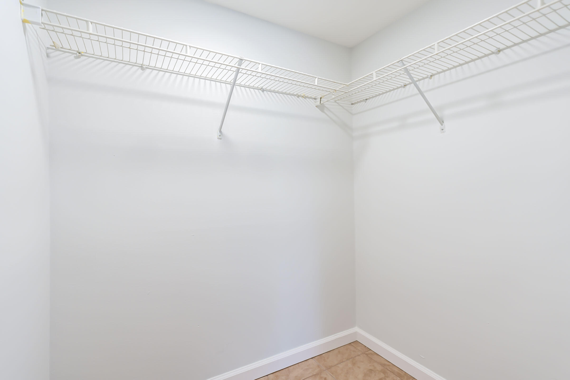 490 Northwest 20th Street, Unit 1030 Boca Raton, FL 33431 - Photo 6 of 18 Primary Bedroom 1 Closet