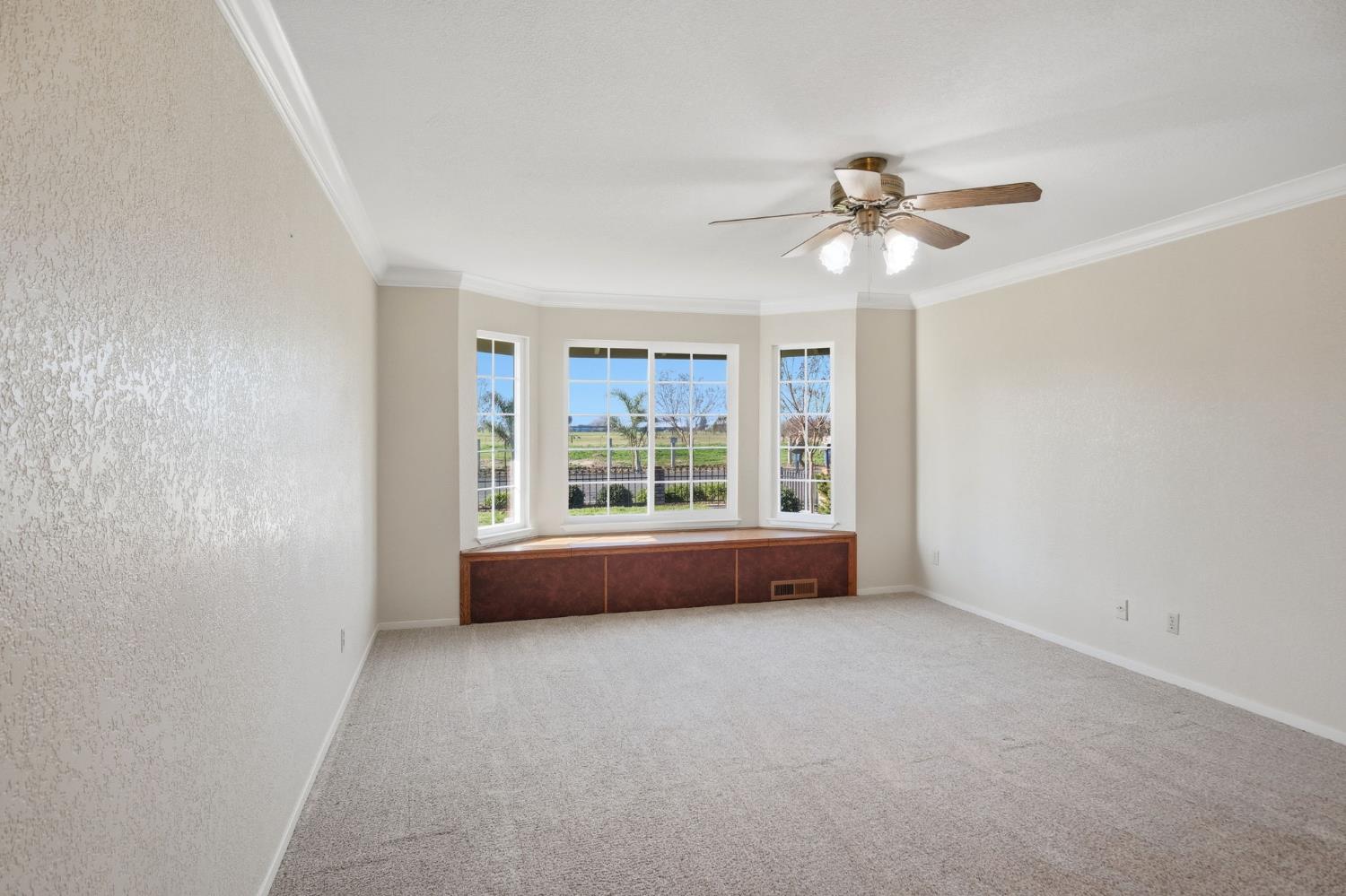 16166 Lawrence Road Escalon, CA 95320 - Photo 22 of 56 wooden floor in an empty room with a window