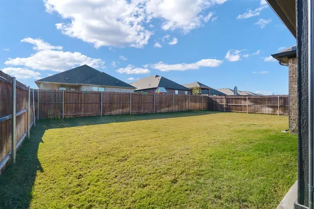 a view of an outdoor space and a yard
