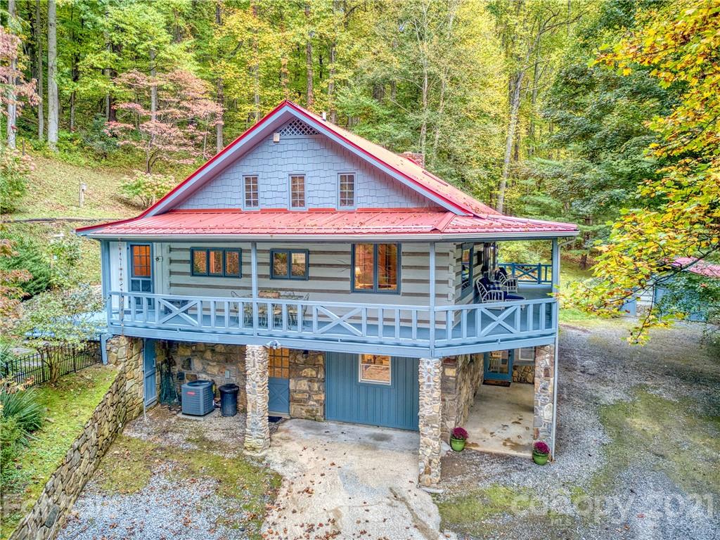 1052 Springbrook Farm Road Waynesville, NC 28786 - Photo 33 of 37 a front view of a house with porch