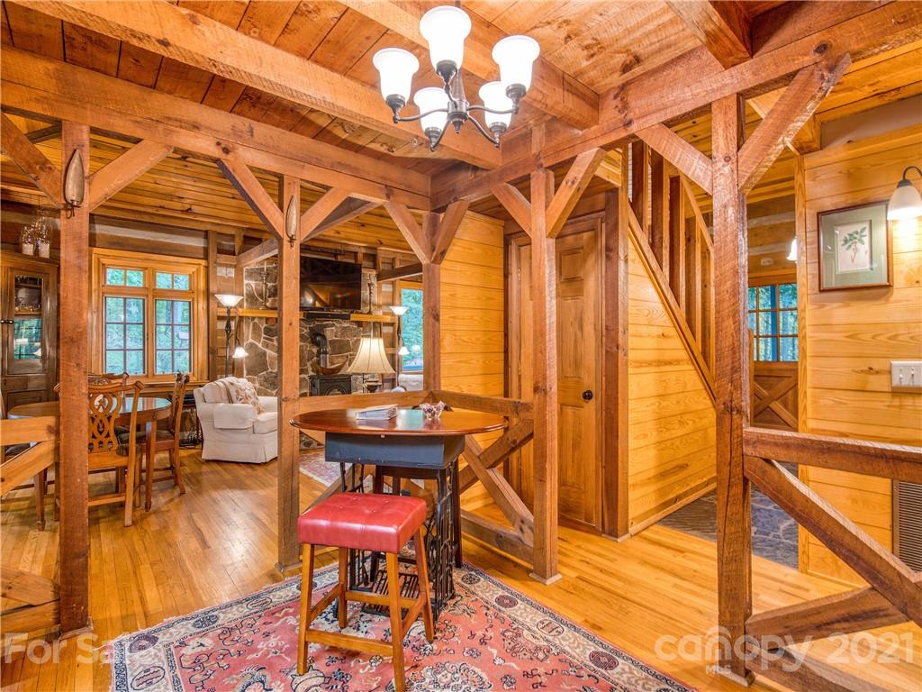 1052 Springbrook Farm Road Waynesville, NC 28786 - Photo 10 of 37 a balcony with table and chairs