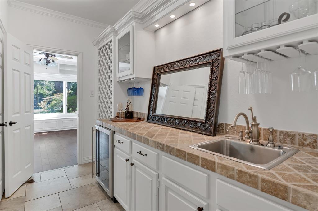 1980 Gertie Barrett Road Mansfield, TX 76063 - Photo 12 of 40 a bathroom with a sink and a mirror