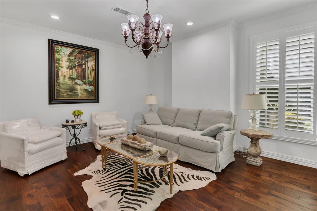 1980 Gertie Barrett Road Mansfield, TX 76063 - Photo 13 of 40 a living room with furniture a chandelier and a window